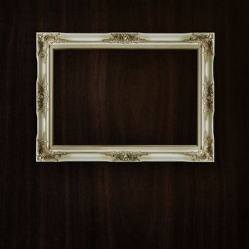 vintage frame on dark wood background