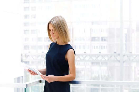 business woman holding reports , copy space