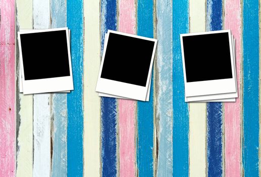 Blank Photos on pastel painting wood background