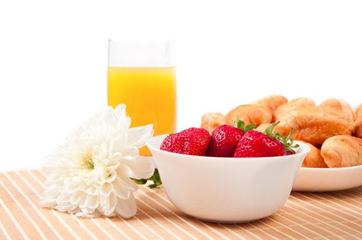 Breakfast with berries,orange juice and croissant, early breakfast