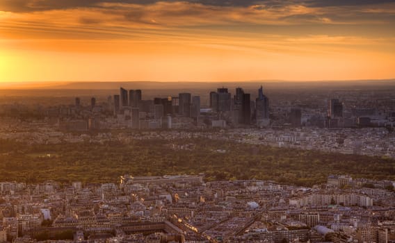 Aerial view of the western part of Paris with La Defense business district at the dusk.