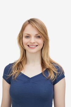 Front view of a woman smiling against a white background