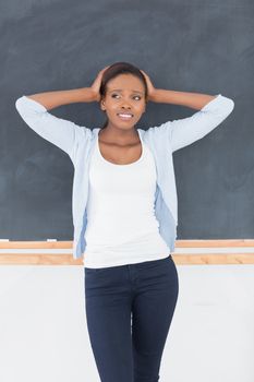 Black woman upset in a classroom