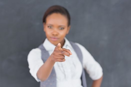 Teacher finger-pointing in a classroom