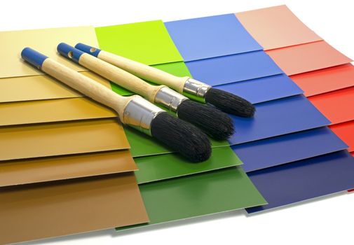 blue green red color samples of painting with paintbrush