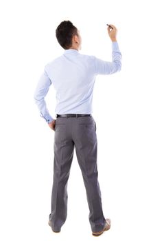 Rear view mid aged Asian male in blue shirt writing something on glass board with marker