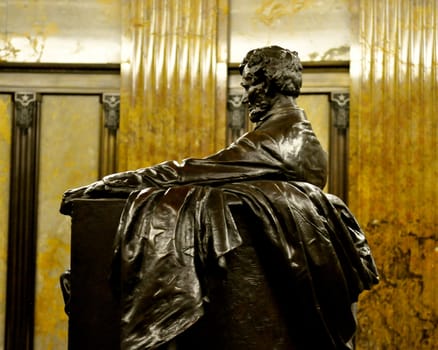 Abraham Lincoln Sits - side view