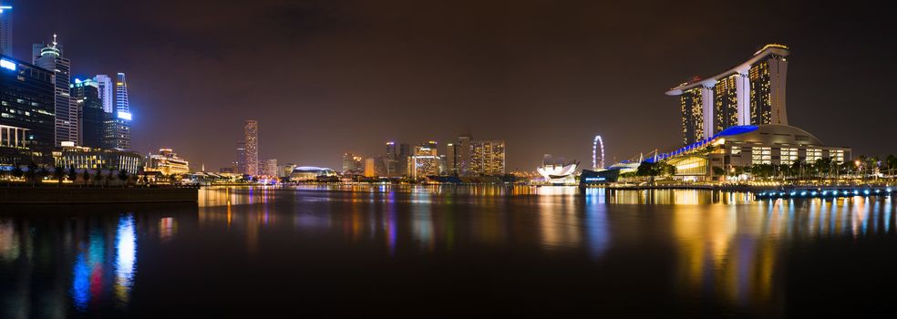 Panorama of Singapore river and skyline at night