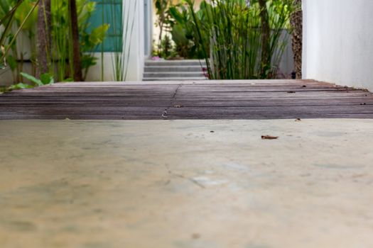 Wooden pathway lead to the room.