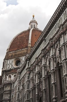 view of the dome and the church of St. Maria Novella in Florence