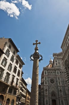 view of the dome and the church of St. Maria Novella in Florence