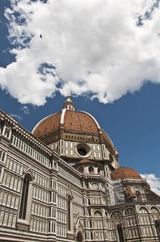 view of the dome and the church of St. Maria Novella in Florence