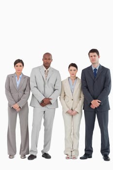 Confident young businessteam standing together against a white background