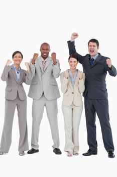 Businessteam cheering together against a white background