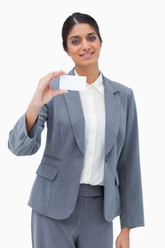 Saleswoman presenting blank business card against a white background
