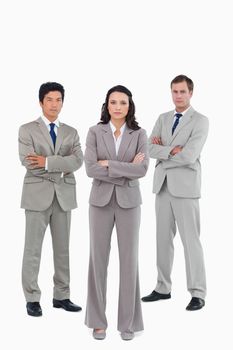 Confident tradesteam with arms folded against a white background