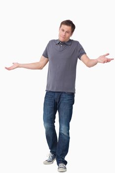 Clueless young man against a white background
