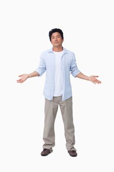 Clueless young male against a white background