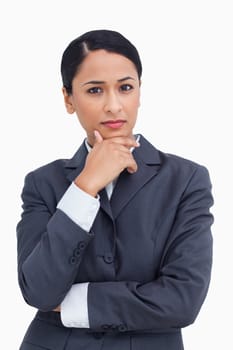 Close up of saleswoman thinking against a white background