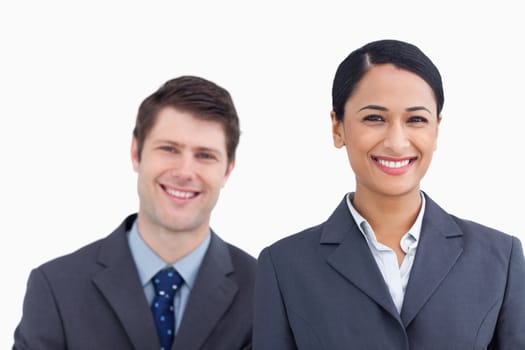 Close up of smiling salesteam against a white background