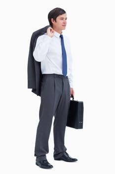 Side view of tradesman with suitcase and jacket against a white background