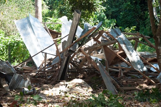 wood building destroyed from bomb