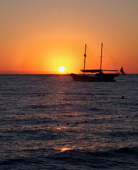 Sunrise Seascape and Sailing Ship early in the morning 