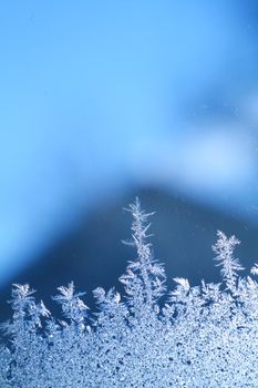 The patterns made by the frost on the window (hoarfrost background)