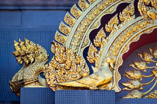 Decoration with golden dragons on the wall