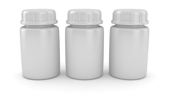 Three blank pill bottles on the white background