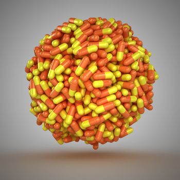 Big sphere made from many yellow-orange capsules