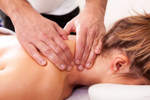 Young beautiful woman getting spa treatment. Spa studio shot