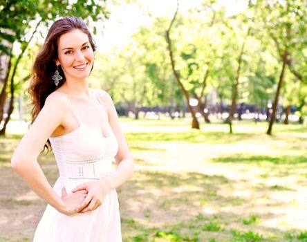 Portrait of an attractive woman in the park