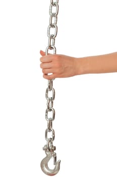 chain with a hook in the hands of crane operator at construction site
