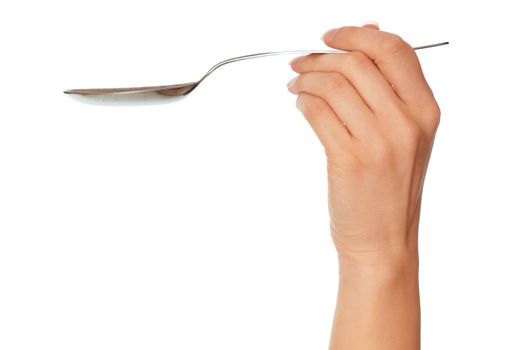woman holding tablespoon in the hand for feeding a sick person