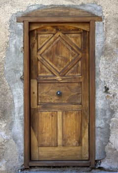 Medieval style door in Grenoble, France.