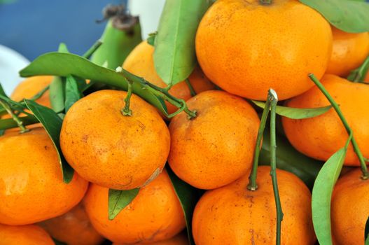 Orange Pile high on a market stall 