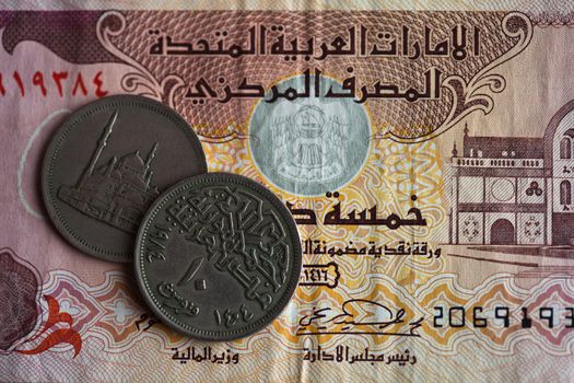 United Arab Emirates banknote background, English The UAE is made up of seven states: Abu Dhabi, Dubai, Sharjah, Ajman, Umm al-Quwain, Ras al-Khaimah and Fujairah.