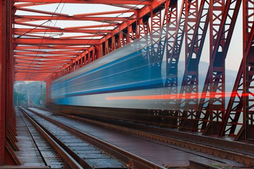 Abstract composition of moving train on the old railway bridge