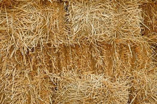 Fragment a pile stacked bales of straw