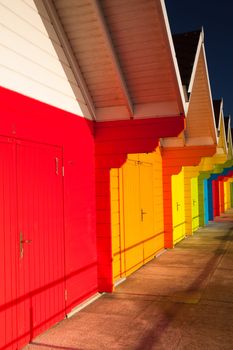 Beach huts at sunrise in Great Britain