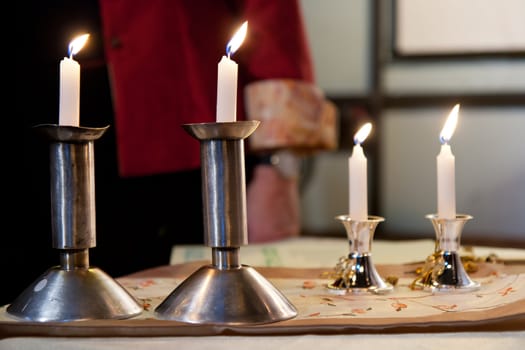 Four candles on the table