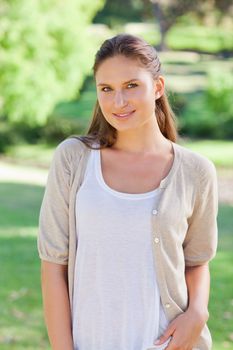 Smiling young woman spending her day in the country side