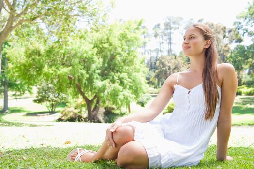 Young woman enjoying her time on the lawn