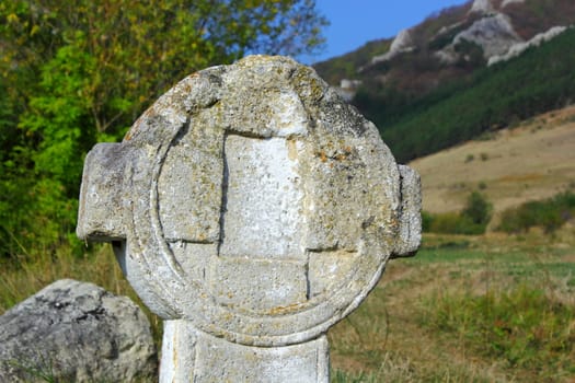 old stone cross near Rimetea, Romania, up in the Trascau mountains