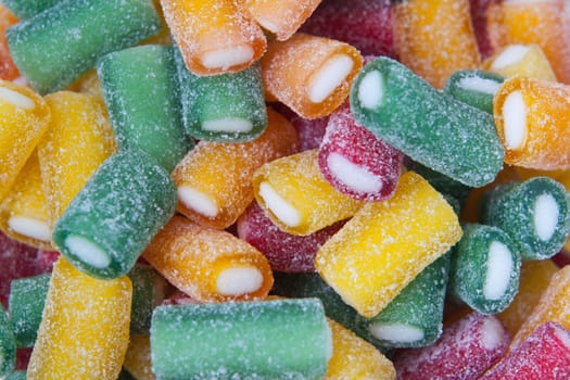 closeup of many colorful winegums isolated