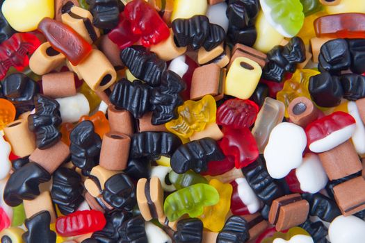 closeup of many colorful winegums isolated