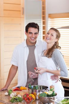 Young couple cooking together