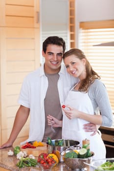 Young couple preparing a meal together