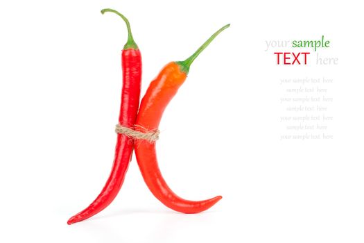 Hot red chili pepper isolated on white